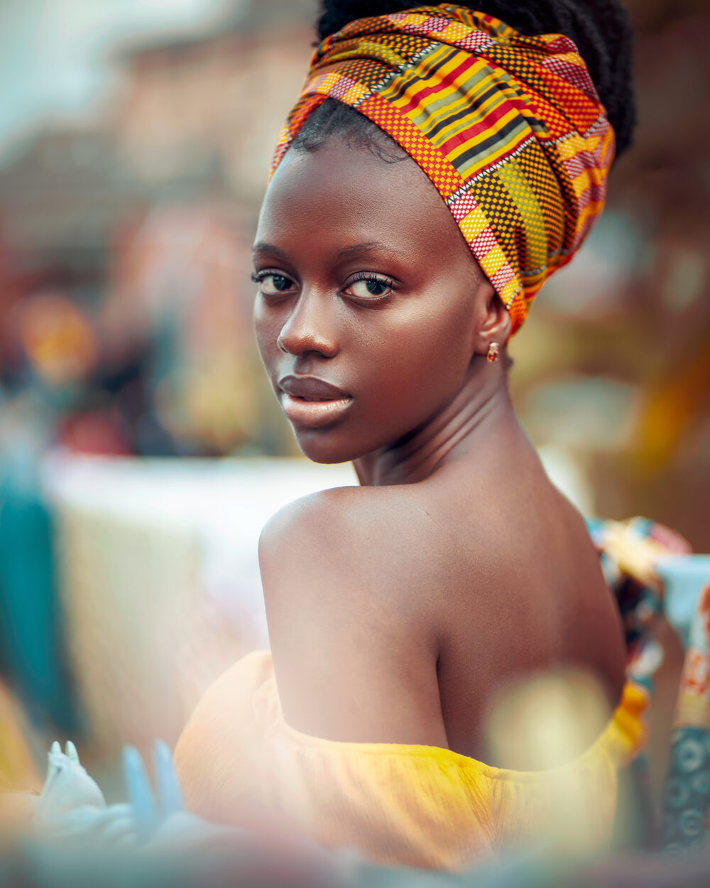 Portrait with kente headwrap, Lagos street