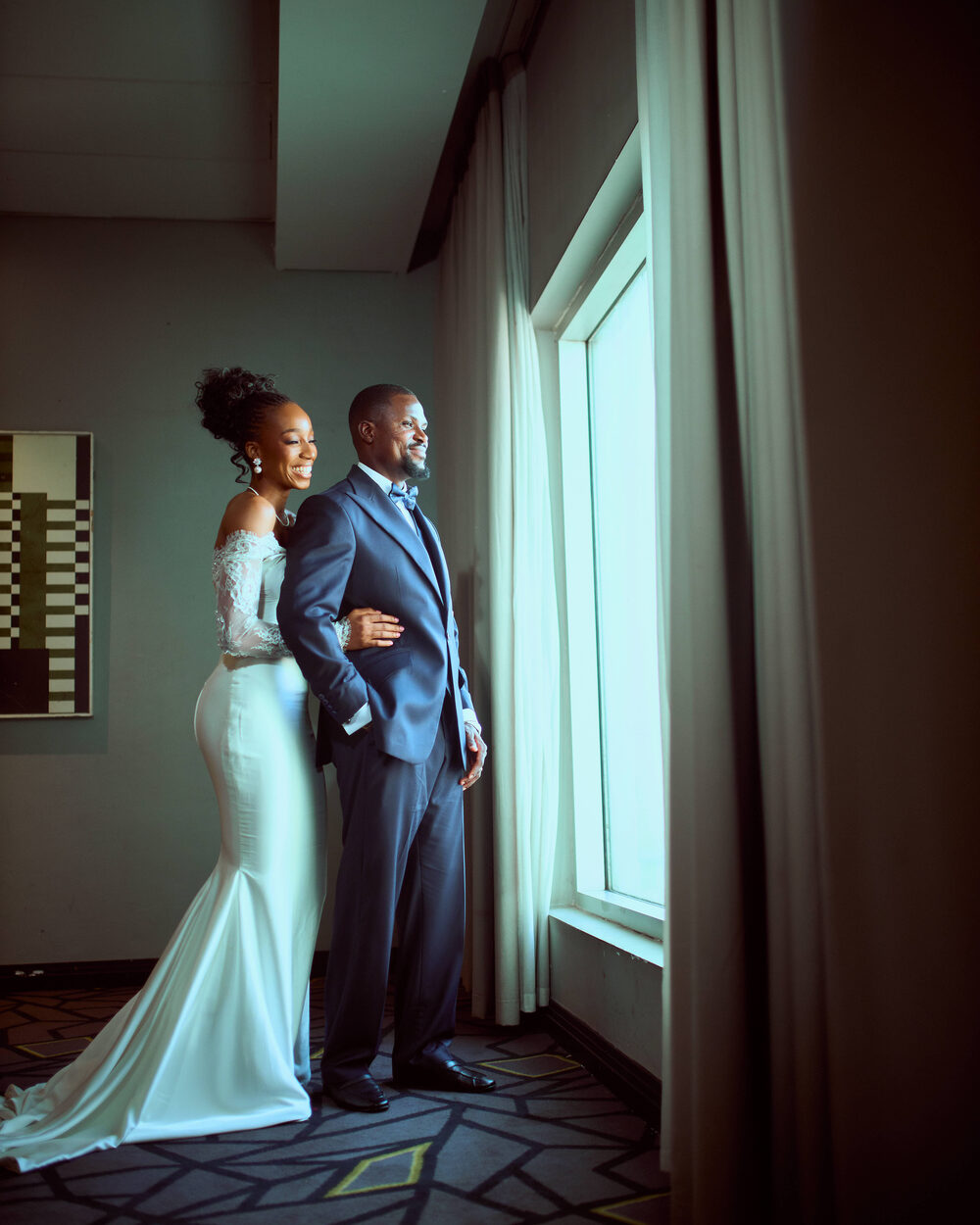 Wedding portrait by the window
